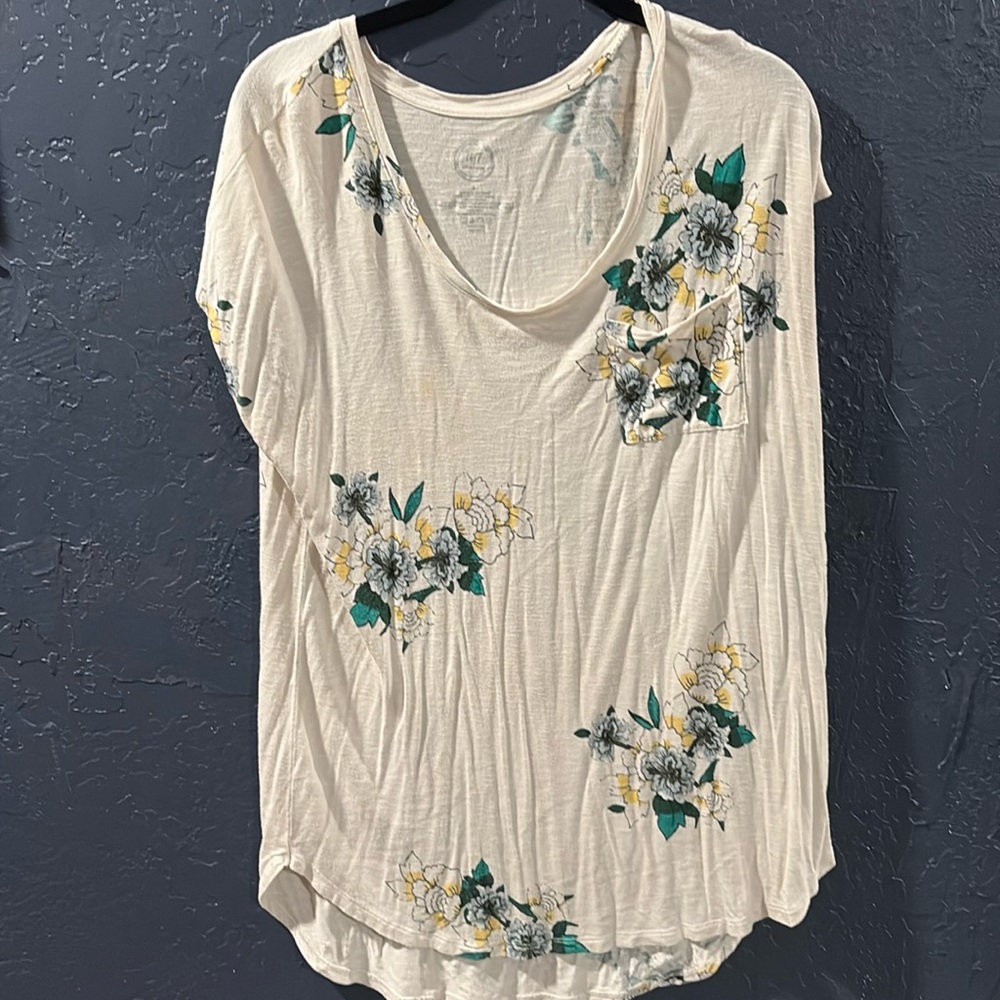 Floral top with pocket on front